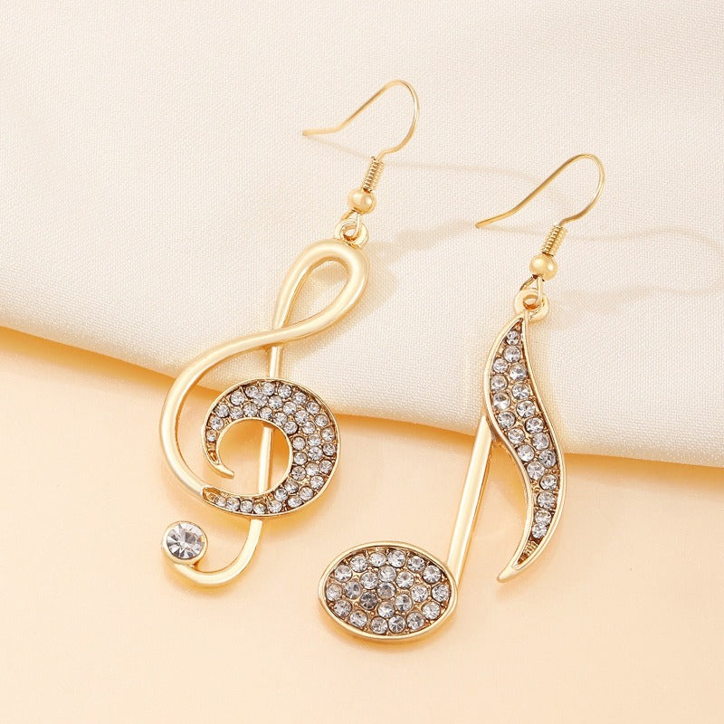 Exquisito diseño de símbolo musical dorado, pendientes de mujer con diamantes de imitación brillantes, regalo para entusiastas de la música navideña